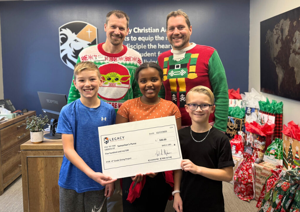 The 4th Grade Students with Winning Essays with Mr. Mulvihill and Mr. Nydam.